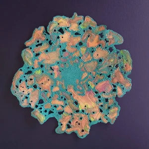 Self dying natural stone